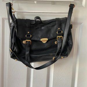 CROSS BODY BAG BRIEFCASE WITH GOLD ACCENTS.LOTS OF POCKET SPACE. LARGE BLACK BAG